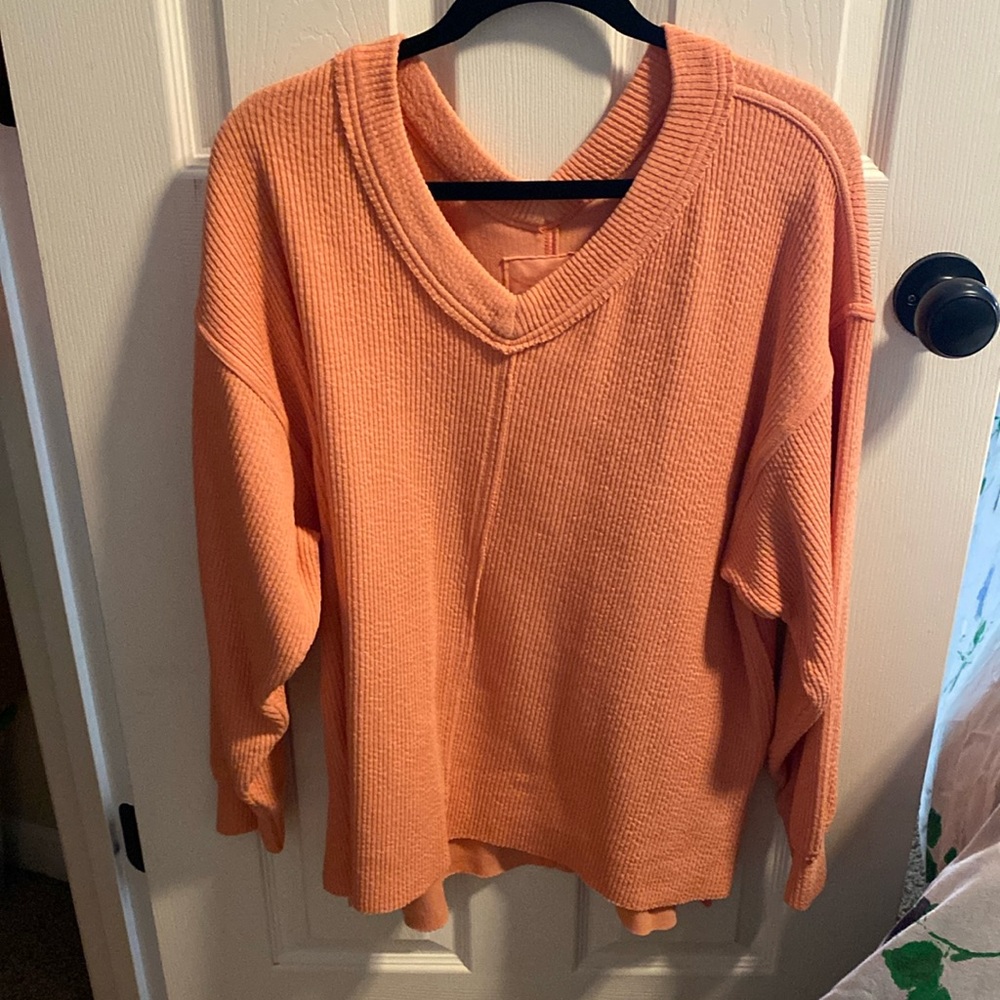 Coral color V-neck sweater